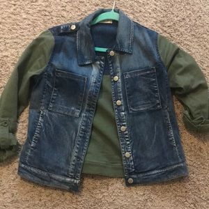 Denim jacket with green sleeve